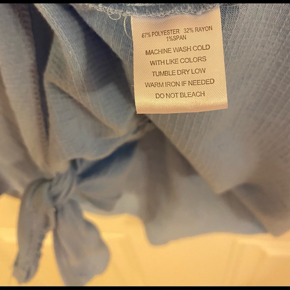 Pretty blue 3/4 sleeve top. Very feminine detail on sleeves. Tie front. - Picture 5 of 8